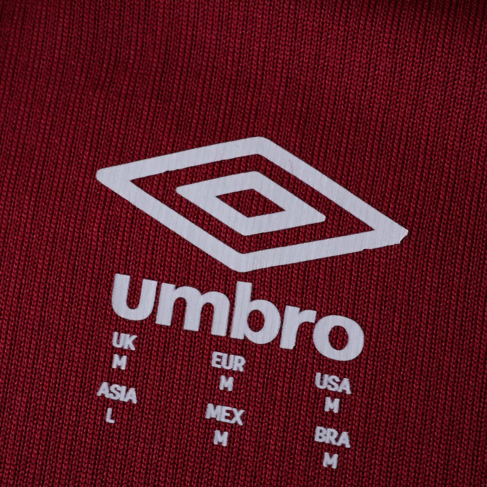 Close-up of the West Ham 2025/26 Home Player Version jersey featuring the white Umbro logo on claret fabric.