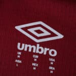 Close-up of the West Ham 2025/26 Home Player Version jersey featuring the white Umbro logo on claret fabric.