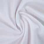 Close-up of white fabric used for the AS Monaco Home 2025/26 Fan Version jersey, showing texture and weave.