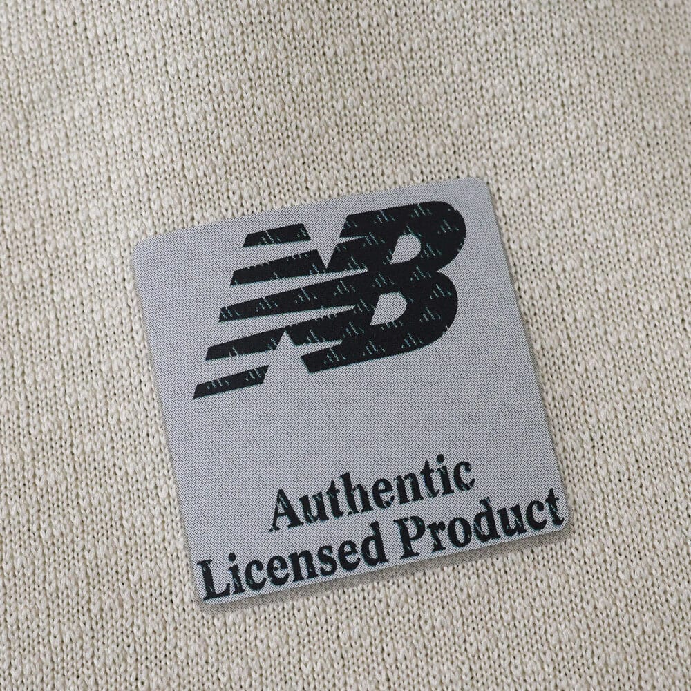Close-up of New Balance "Authentic Licensed Product" label on FC Porto Third 2025/26 Fan Version shirt.