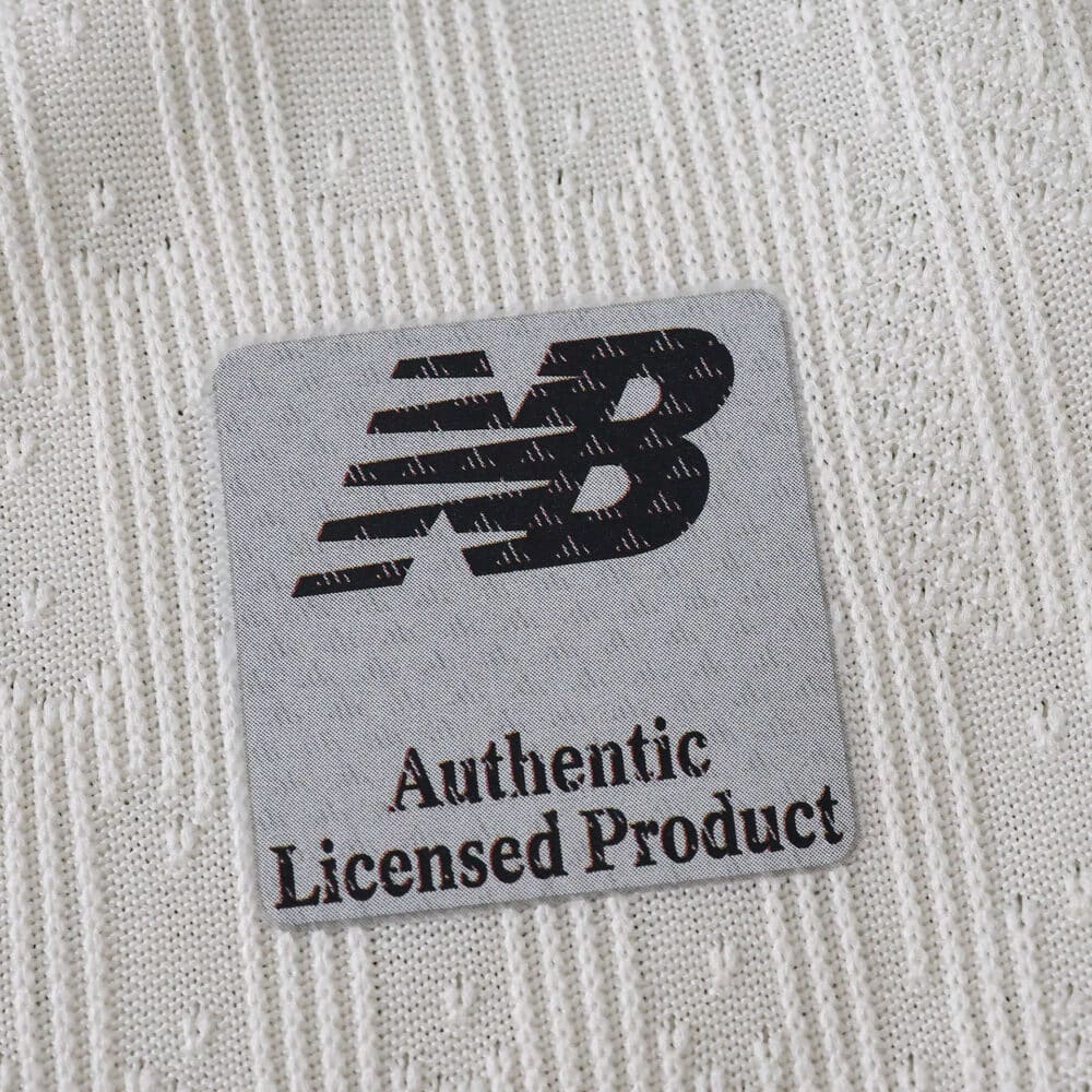 Close-up of New Balance Authentic Licensed Product badge on FC Porto Third 2025/26 Player Version jersey.