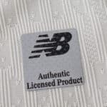 Close-up of New Balance Authentic Licensed Product badge on FC Porto Third 2025/26 Player Version jersey.