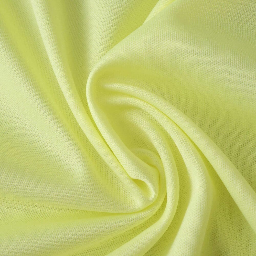 Close-up of light yellow fabric texture for Fenerbahce Away 2025/26 Fan Version jersey.
