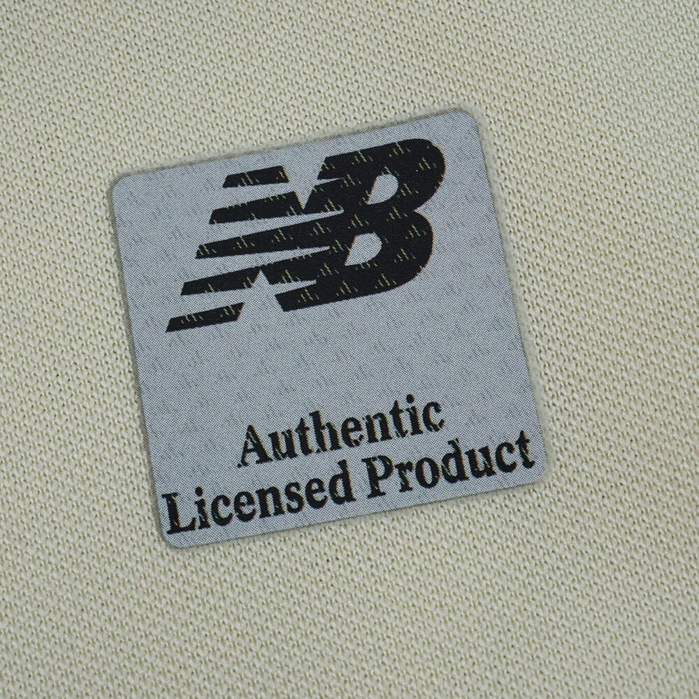 Close-up of "Authentic Licensed Product" New Balance patch on Lille LOSC Away 2025/26 Fan Version jersey.