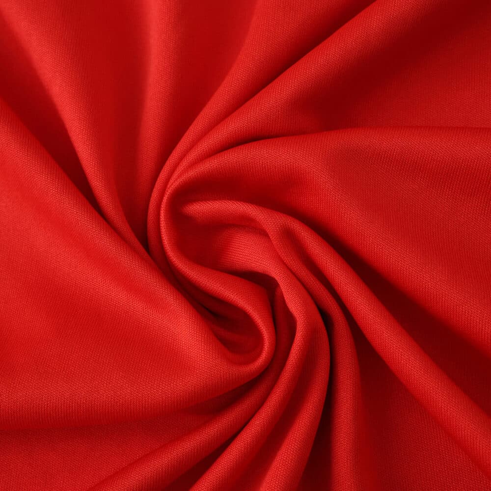 Close-up of the red fabric used for the Nottingham Forest Home 2025/26 Fan Version jersey.