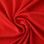 Close-up of the red fabric used for the Nottingham Forest Home 2025/26 Fan Version jersey.