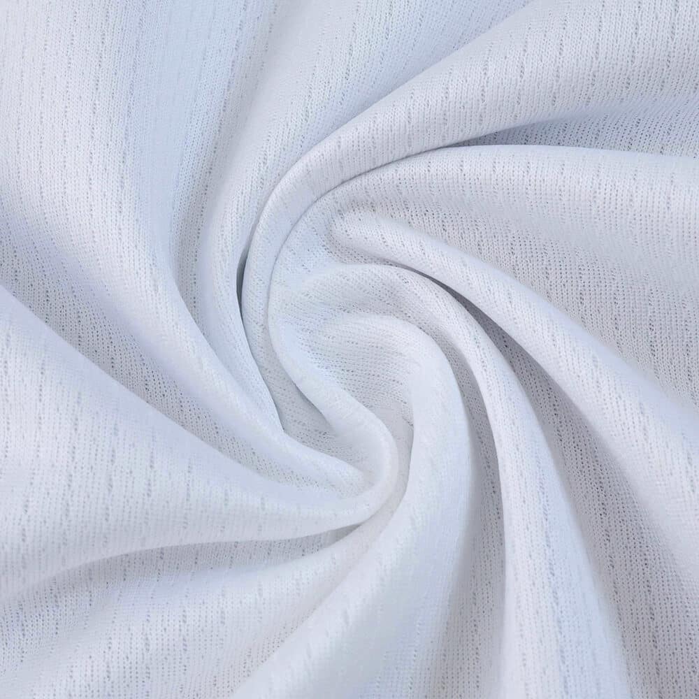 Close-up of white Real Valladolid 2025/26 Home Fan Version jersey fabric showing texture and weave.