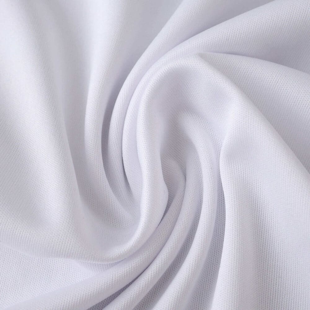 Close-up of white Sevilla FC 2025/26 Home Fan Version jersey fabric with visible texture and soft folds.