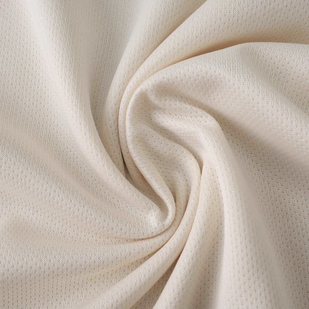 Close-up of the West Ham United 2025/26 Away Fan Version jersey fabric showing texture and weave.