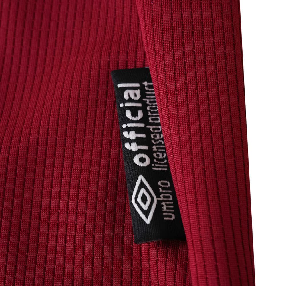Close-up of the official Umbro tag on the 2025/26 West Ham United Home Player Version jersey.