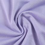 Close-up of the lilac fabric used for the Brighton & Hove Albion Away 2025/26 Fan Version jersey.