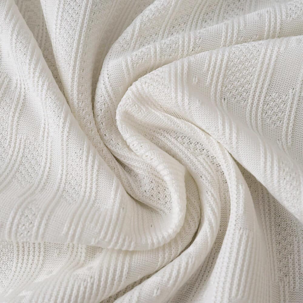 Close-up of FC Porto Third 2025/26 player version fabric in white with textured patterns.