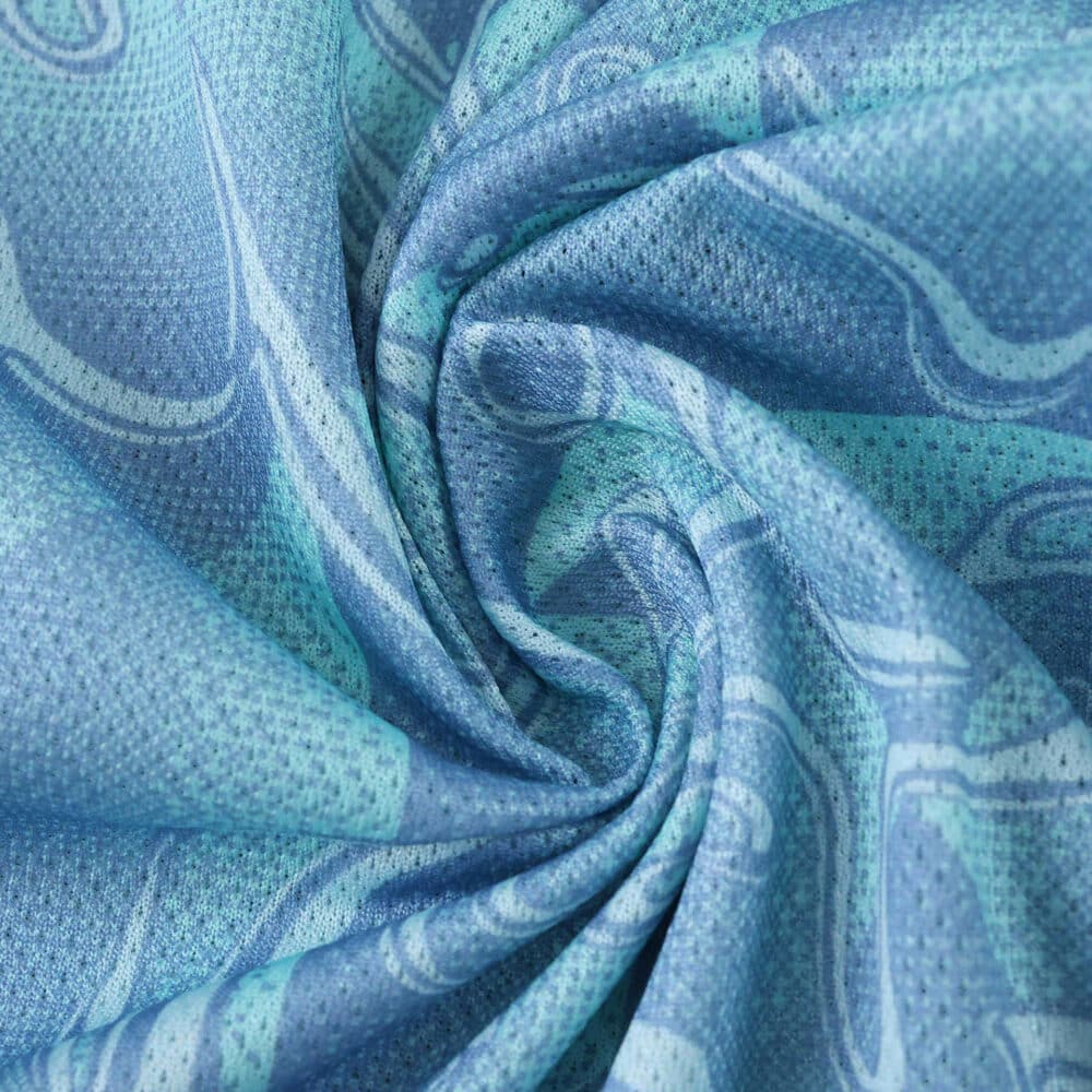 Close-up of the Juventus Away 2025/26 Player Version jersey fabric showing blue pattern and texture.