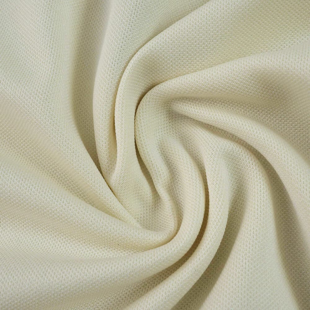 Close-up of the Lille LOSC 2025/26 Away Fan Version jersey fabric in off-white, showing its texture.