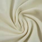 Close-up of the Lille LOSC 2025/26 Away Fan Version jersey fabric in off-white, showing its texture.