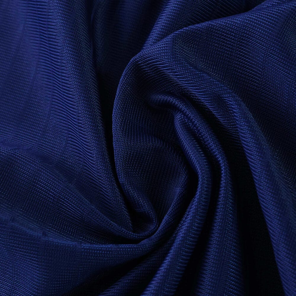 Close-up of the deep blue fabric used for the Newcastle United Third 2025/26 Player Version shirt.