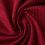 Close-up of the ribbed claret fabric used in the West Ham United 2025/26 Home Player Version shirt.