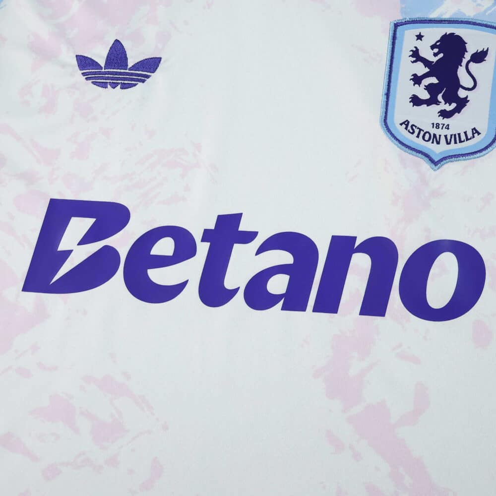 Aston Villa 2025/26 third fan jersey with club crest, Betano sponsor, and Adidas logo on white fabric.
