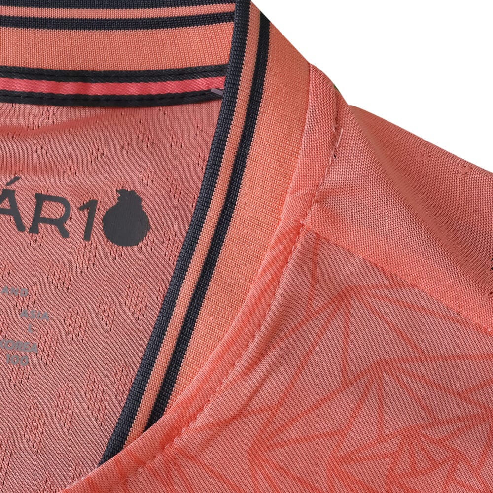 Close-up of FC Porto Away 2025/26 Player Version jersey collar with pink fabric and navy stripe details.