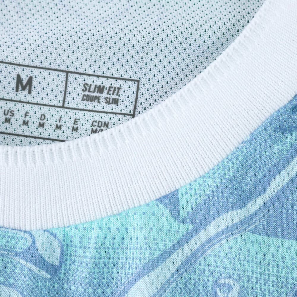 Close-up of Juventus Away 2025/26 Player Version jersey collar and inner label showing size M.