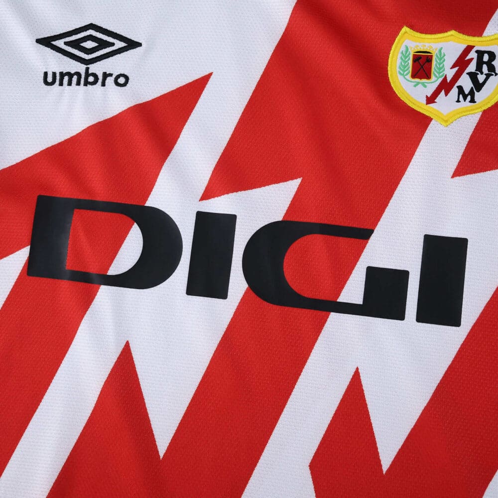 Close-up of Rayo Vallecano 2025/26 home fan jersey featuring club crest, Umbro logo, and DIGI sponsor.