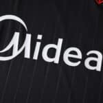 Close-up of the Sevilla FC 2025/26 Third Fan Version jersey featuring the Midea sponsor logo on black fabric.