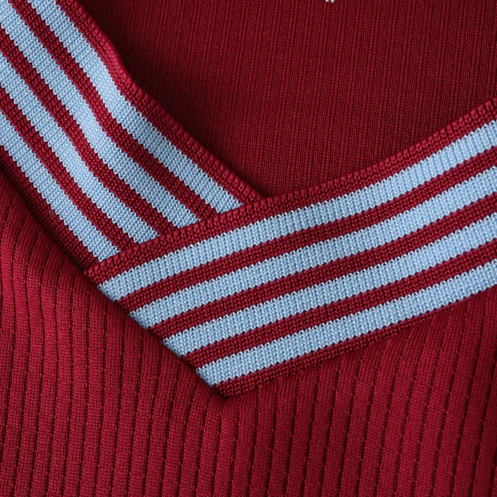 Close-up of West Ham United 2025/26 Home Player Version jersey collar with claret and blue stripes.