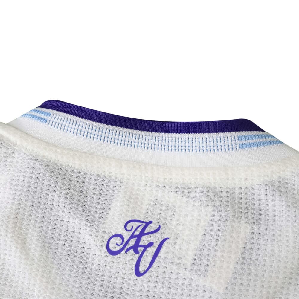 Close-up of the collar on the Aston Villa Third 2025/26 Player Version jersey, showing AV initials.