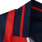 Close-up of the Bologna Home 2025/26 fan jersey collar with navy and red stripe detailing.