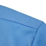 Close-up of the Lazio Home 2025/26 Fan Version jersey collar in light blue fabric.