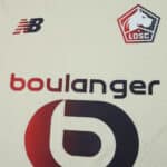 Close-up of Lille LOSC Away 2025/26 fan jersey featuring club crest, New Balance logo, and Boulanger sponsor.