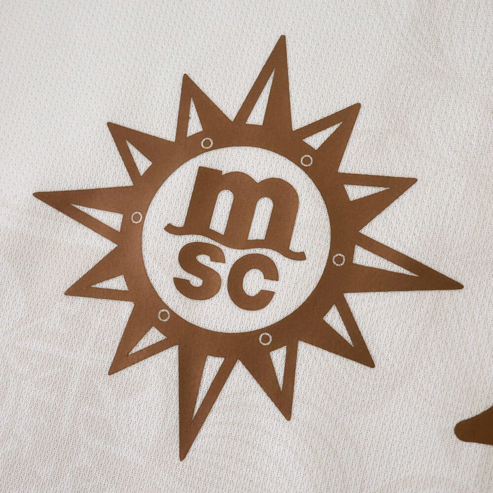 Close-up of the MSC logo in bronze on the Napoli Away 2025/26 Fan Version jersey.