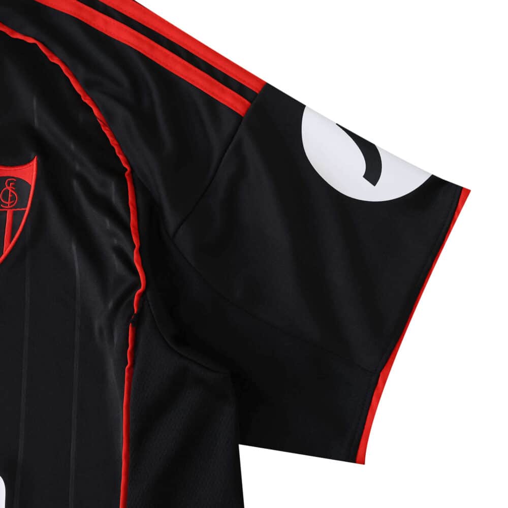 Detail of the Sevilla FC Third 2025/26 Fan Version jersey sleeve with red accents and sponsor logo.