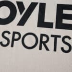 Close-up of the West Ham United 2025/26 away fan jersey featuring sponsor "BOYLESPORTS" text.