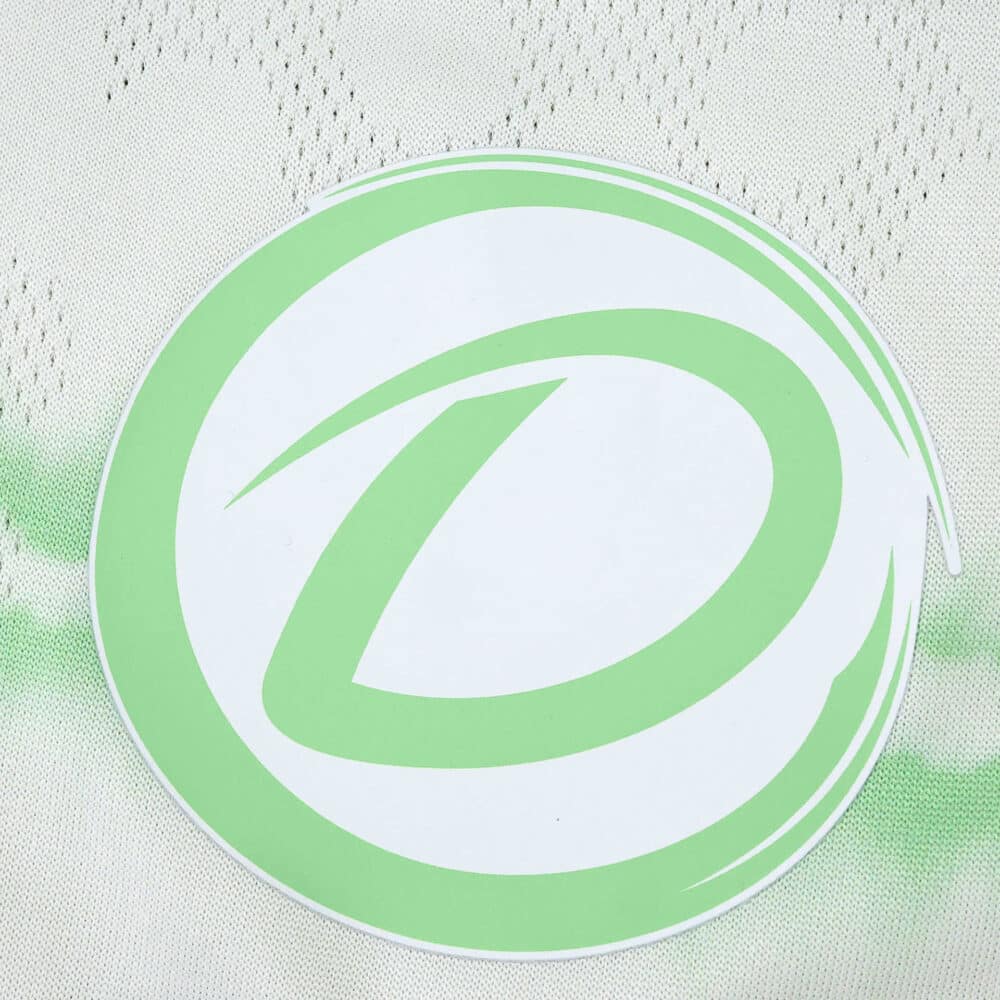 Close-up of the Celtic Third 2025/26 Player Version kit featuring a large green circular logo detail.