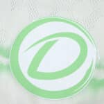 Close-up of the Celtic Third 2025/26 Player Version kit featuring a large green circular logo detail.