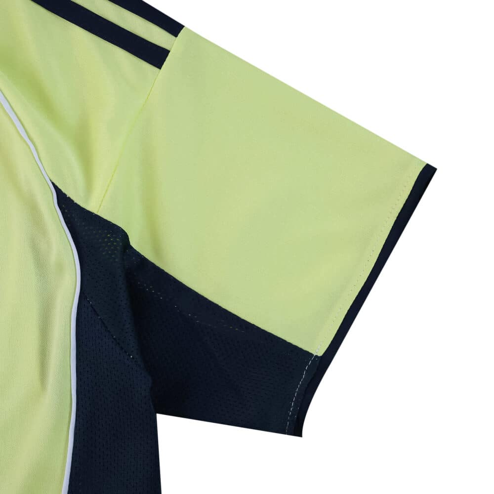 Detail of the Fenerbahce Away 2025/26 Fan Version jersey sleeve showing yellow and navy color blocking.