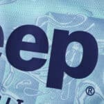 Close-up of Juventus Away 2025/26 Player Version jersey showing sponsor logo and fabric texture.